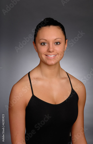 Dancer studio portrait on a grey background