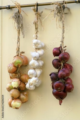 Hanging plaits of onion and garlic