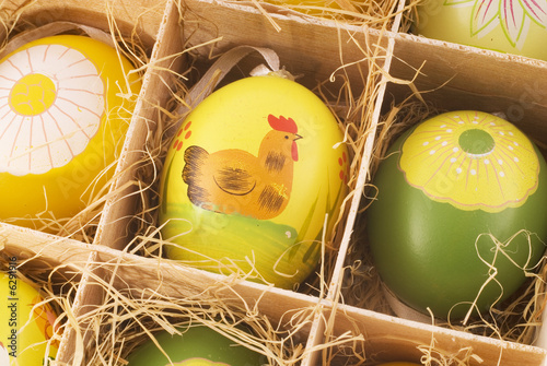 detail of a box with painted easter eggs photo