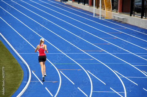 runner on blue track