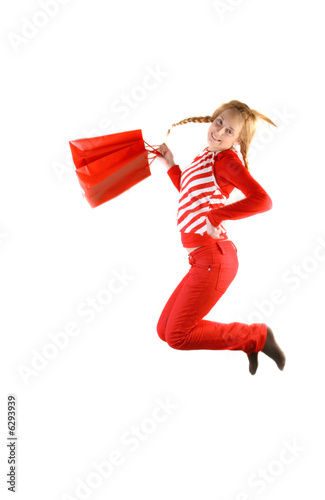 pretty teenagergirl with shopping bags photo
