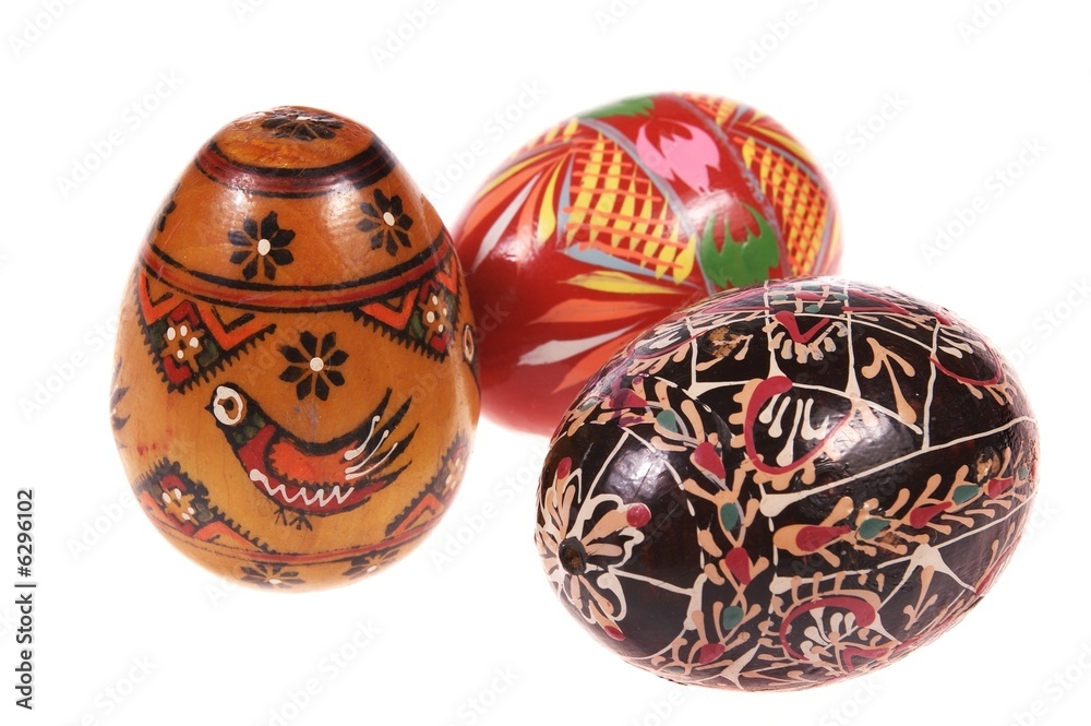 three colorful Easter eggs isolated on white three colorful Easter eggs isolated on white