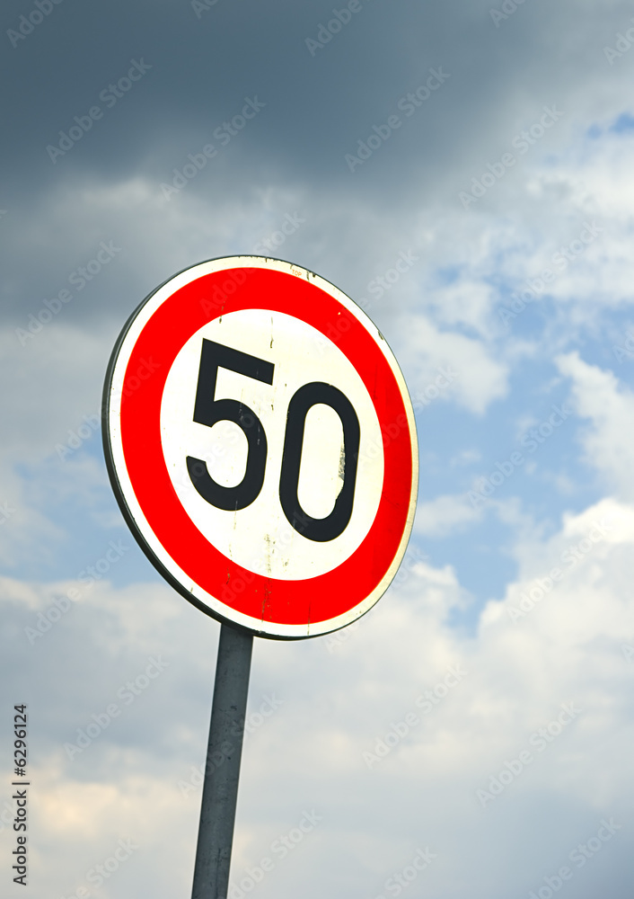 Traffic sign against a blue sky. Traffic sign against a blue sky.