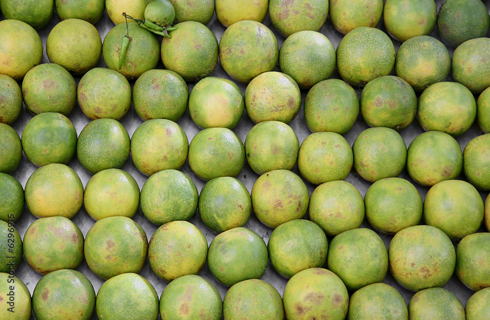 oranges stacked up in juice shop, delhi, india oranges stacked up in juice shop, delhi, india