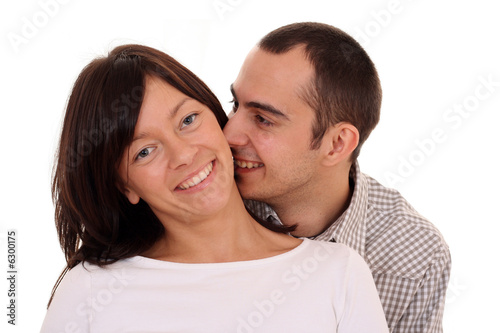 happy couple - woman and man 25-30 years old isolated on white