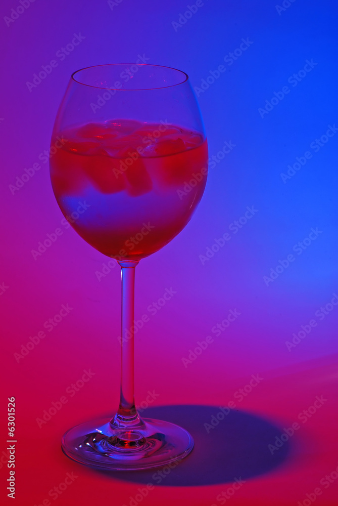 A cocktail in colorful light A cocktail in colorful light