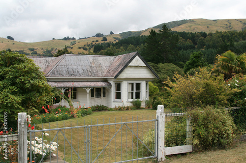 An old white timber house in rural area