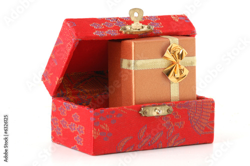 red chest with gift box inside