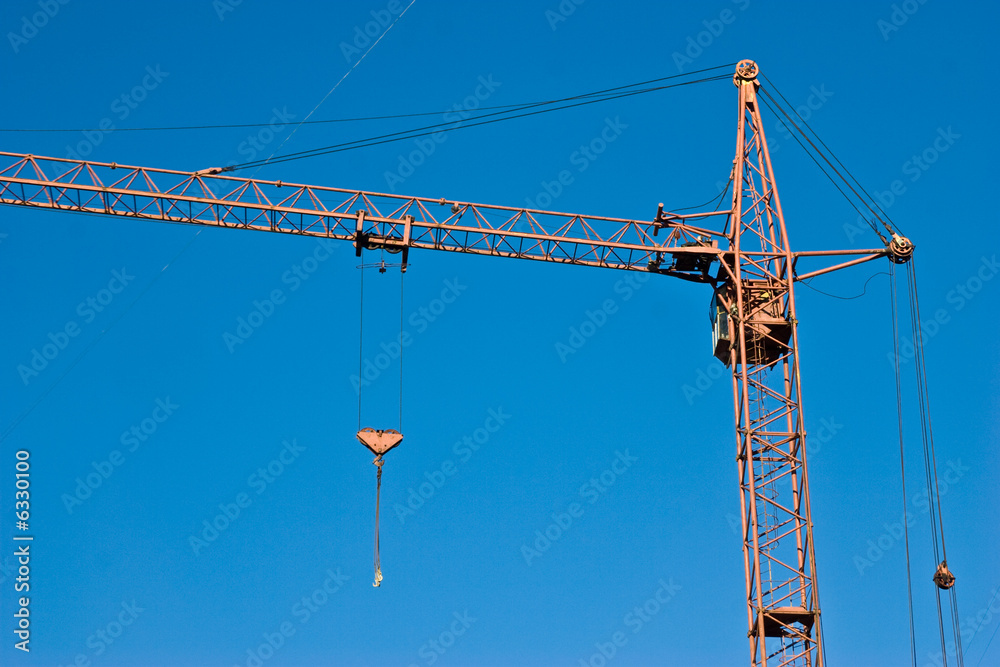 construction series: crane with gibbet on the blue sky construction series: crane with gibbet on the blue sky