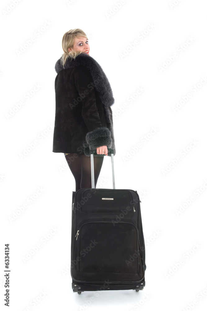 Beautiful blonde with valise on black background Beautiful blonde with valise on black background