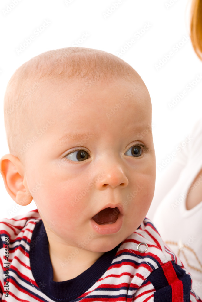 small amazed boy with mother on a white background small amazed boy with mother on a white background