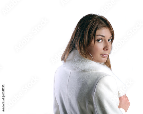 Isolated portrait of beautiful woman in a winter coat