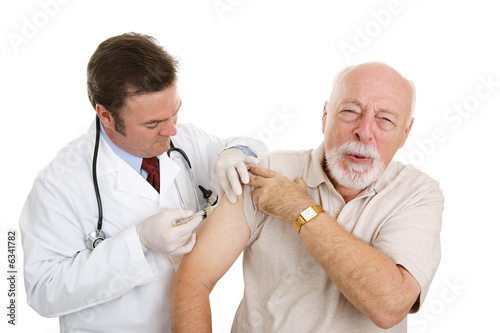 Senior Man Getting A Painful Injection From His Doctor Stock Photo Adobe Stock