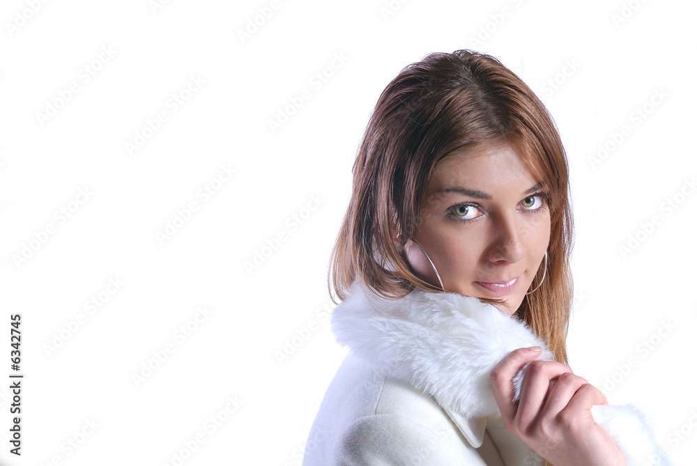 Isolated portrait of beautiful woman in a winter coat