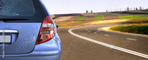 Blue car on the road