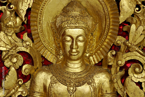Buddha Carving inside a temple  Luang Prabang  Laos.