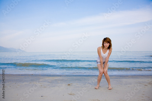 woman having fun by the beach