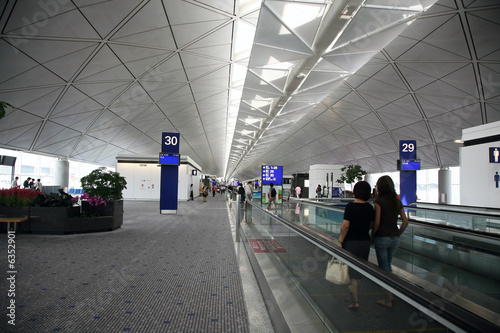 people traveling at the airport