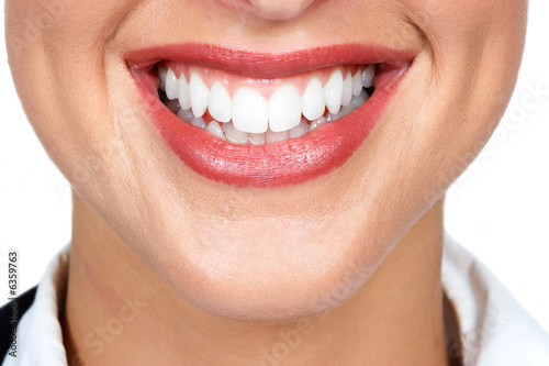Smile woman mouth with great teeth. Over white background.