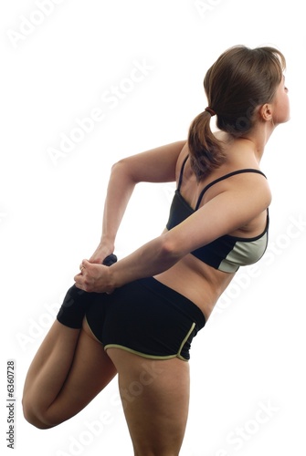 Isolated attractive fitness woman making stretching 