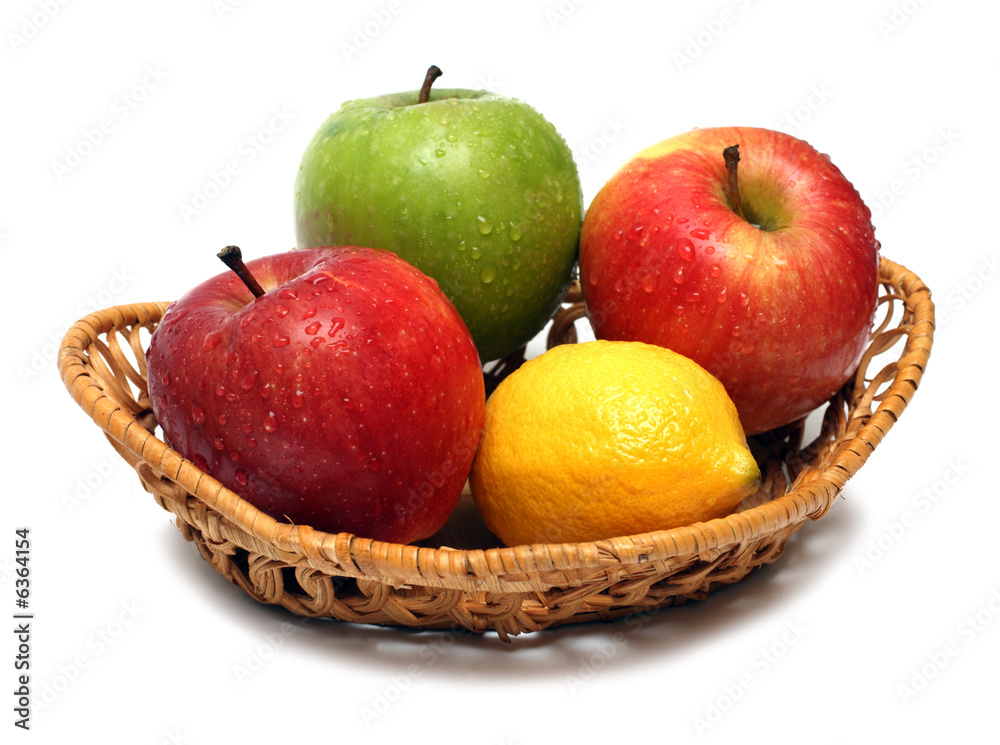 basket with wet fruits isolated on white basket with wet fruits isolated on white