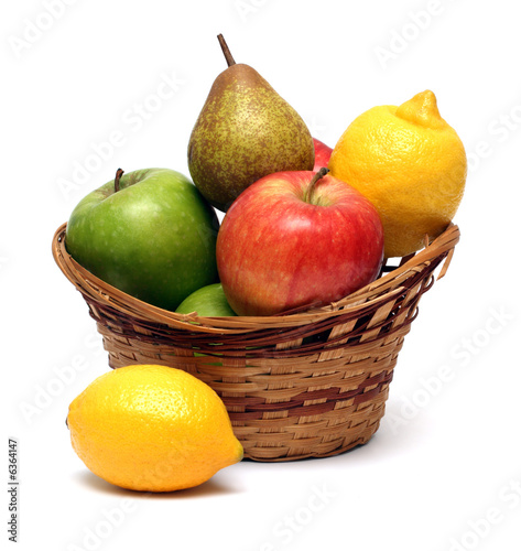 basket with fruits isolated on white