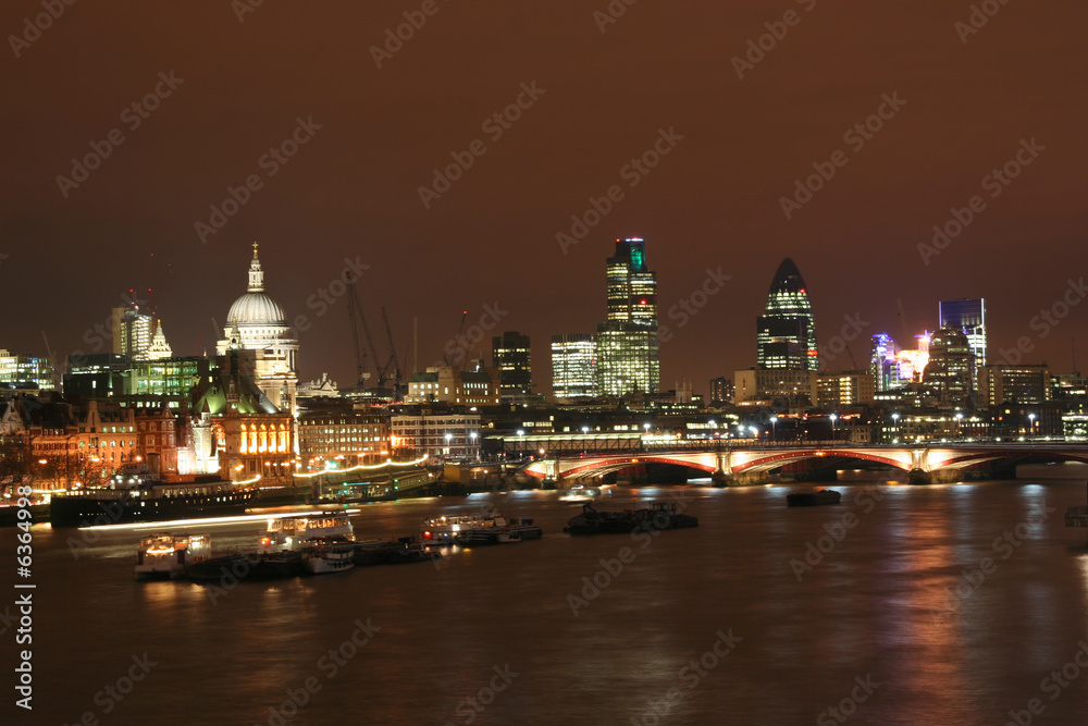 The Thames at night, with St. Pauls cathedral and the City