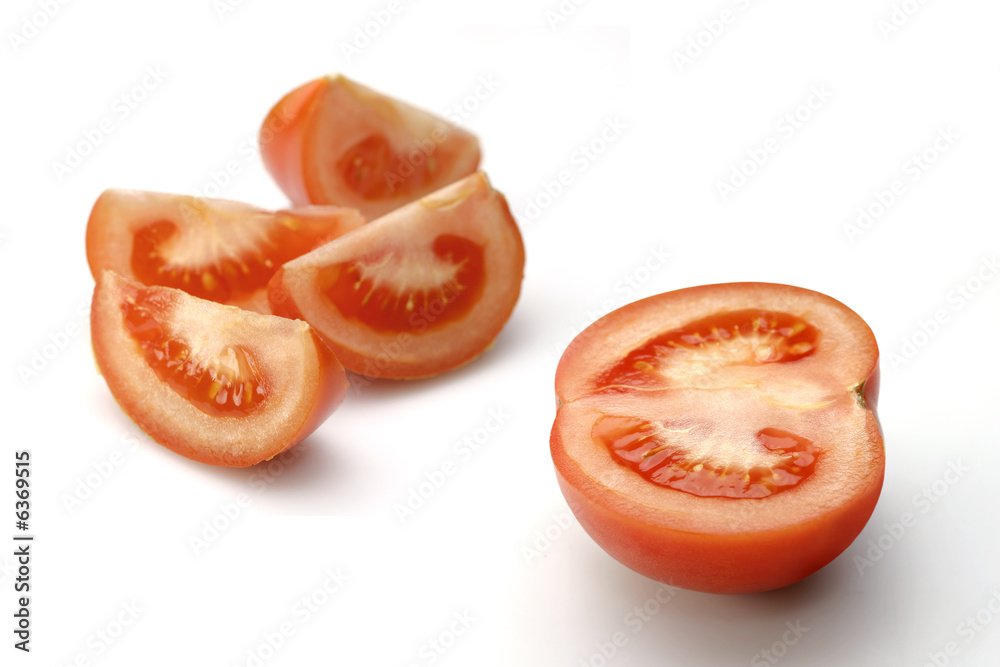 Cut sunny tomato on white (with path) Cut sunny tomato on white (with path)