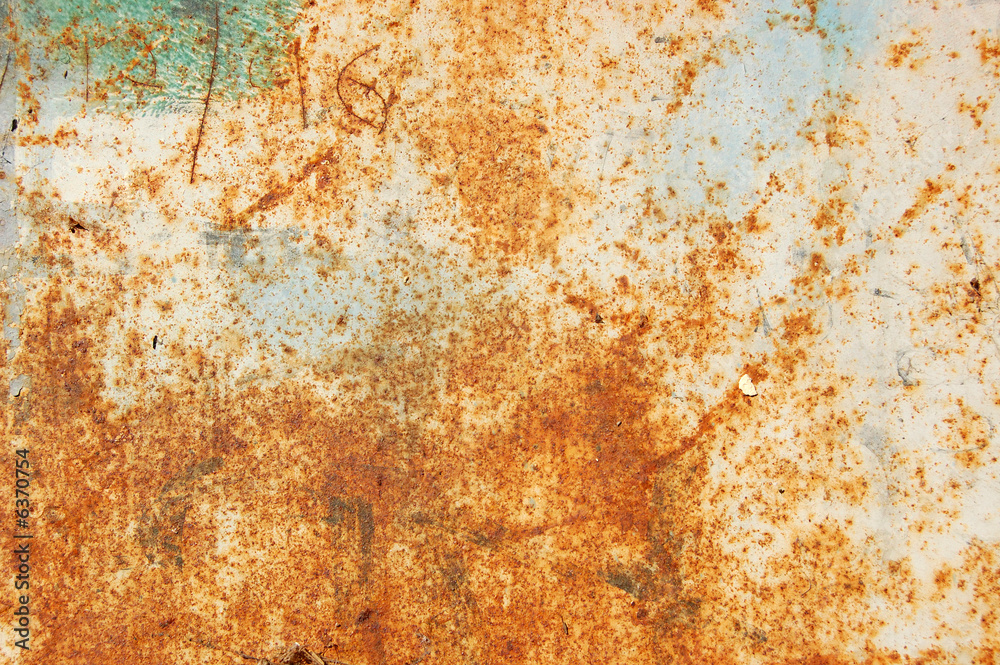 Rusty metal surface with peeled paint. Abstract background. Rusty metal surface with peeled paint. Abstract background.