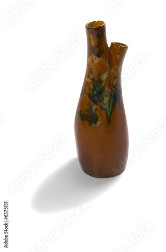Isolated clay vase on white - souvenir