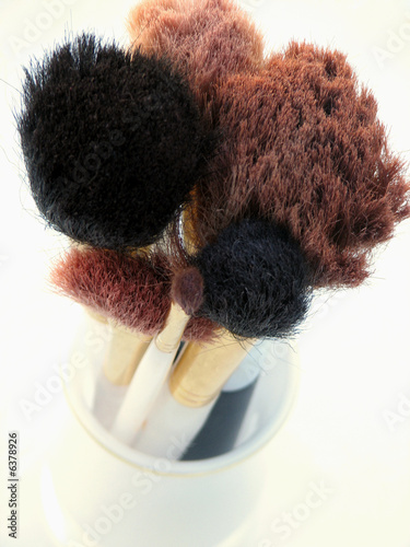 Makeup brushes fading to white