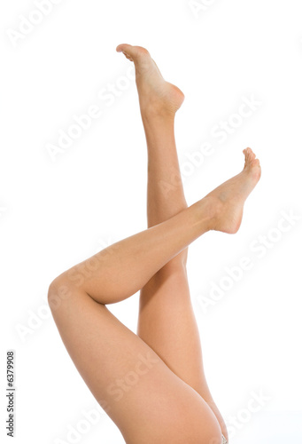 Woman legs on isolated background