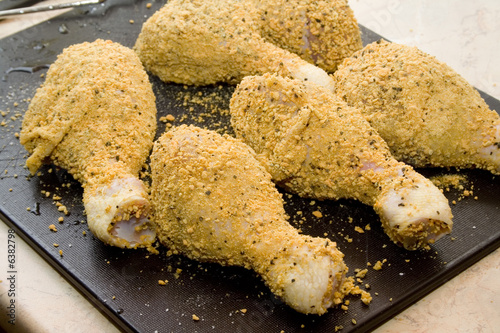 coated raw chicken drumsticks