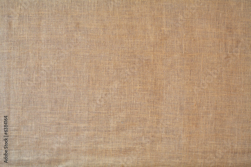 Old stained and worn burlap background texture