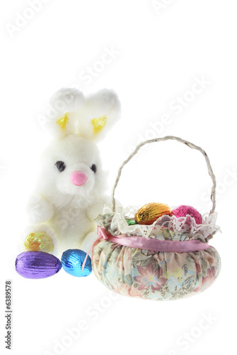 Easter Bunny and Basket on White Background © Silkstock