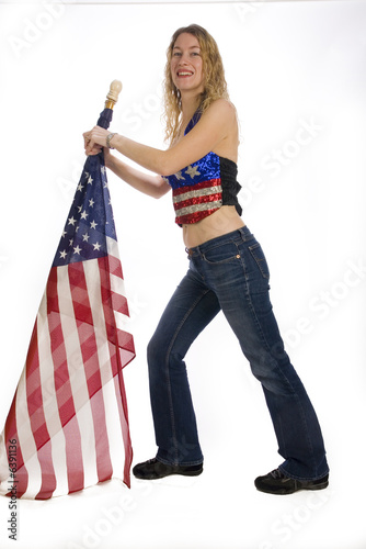 Shot of a Beuatiful Blond Woman with an American Flag