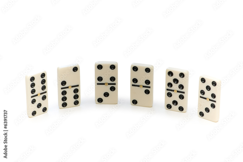 Various domino pieces isolated on the white Various domino pieces isolated on the white