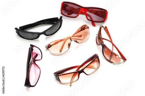 Various sunglasses isolated on the white background