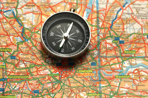 Compass over the map of UK - London suburbs © Elnur
