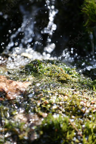 Stream of water falling downwards