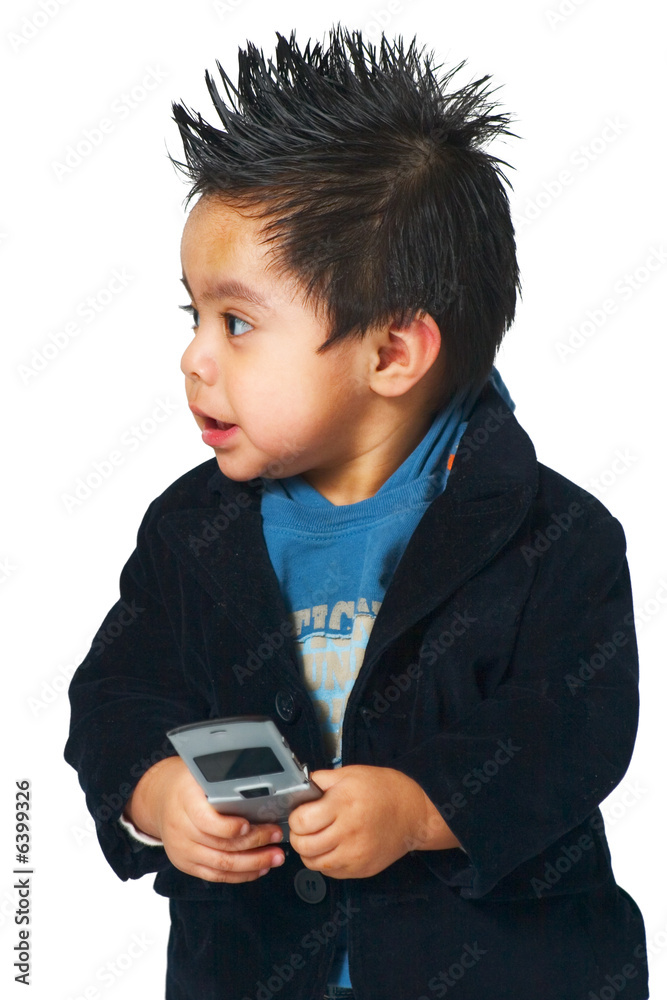 © Monart Design - Hispanic child dialing on cell phone