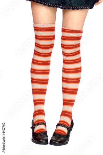 young woman's legs wearing stripedknee-length socks
