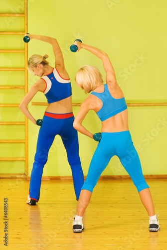 Women exercising in fitness club