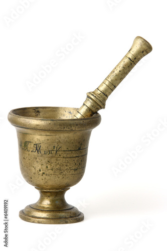 ancient bronze mortar with pestle on white background