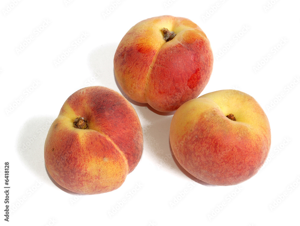 Fresh peaches against white background Fresh peaches against white background