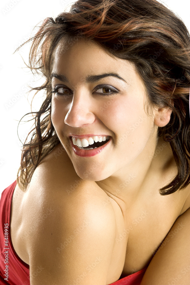 Portrait of a happy beautiful young woman laughing Portrait of a happy beautiful young woman laughing