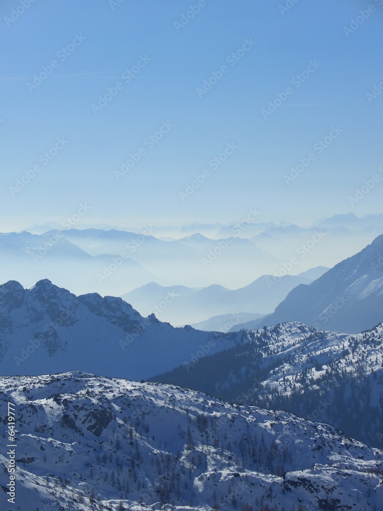 High angle view of the winter Giulian alps in the fog