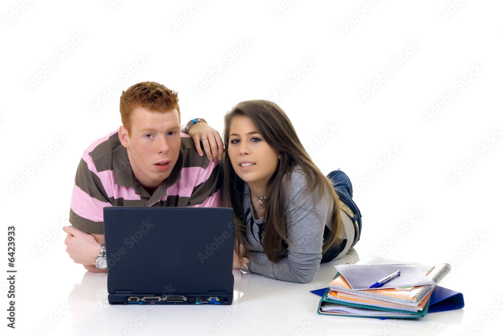 trendy teenager students doing schoolwork on laptop, 