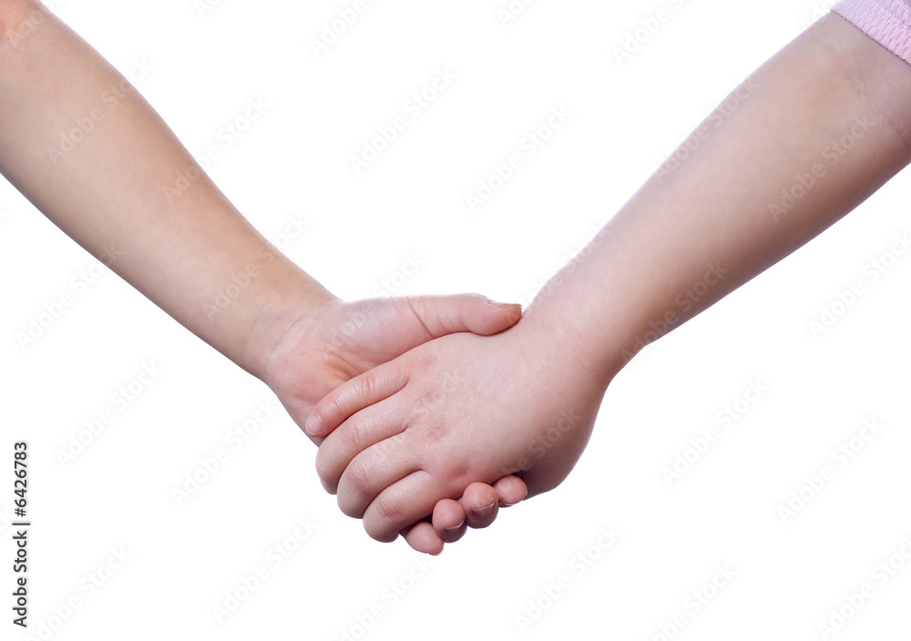 Two young sisters holding hands. Isolated on white Two young sisters holding hands. Isolated on white
