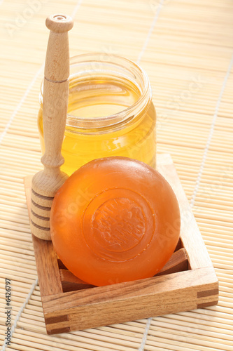 bar of gliceryne soap and jar of honey - natural bath